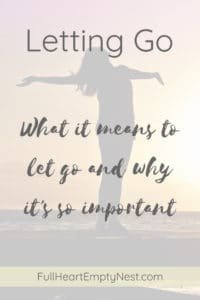 words letting go, what it means to let go and why it's so important in grey over a picture of a woman with outstretched arms standing on a dock